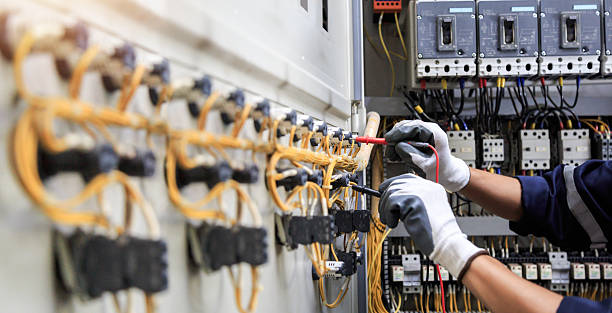 Professional Electrician technician working in Paw Paw Lake, MI